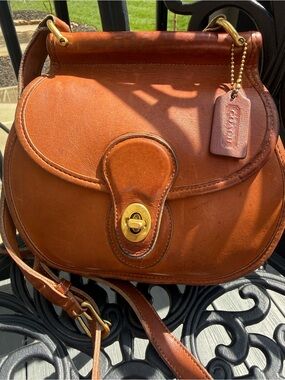 Coach British Tan Post Pouch.